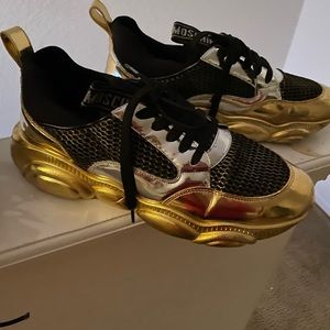 Moschino black gold sneakers / size 12 / in great condition